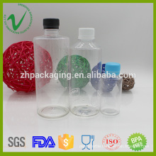 Transparent food grade empty juice PET plastic bottle with tamperproof cap